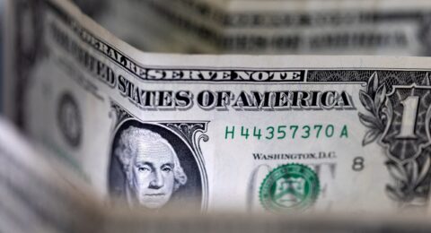 FILE PHOTO: Illustration shows U.S. dollar banknotes